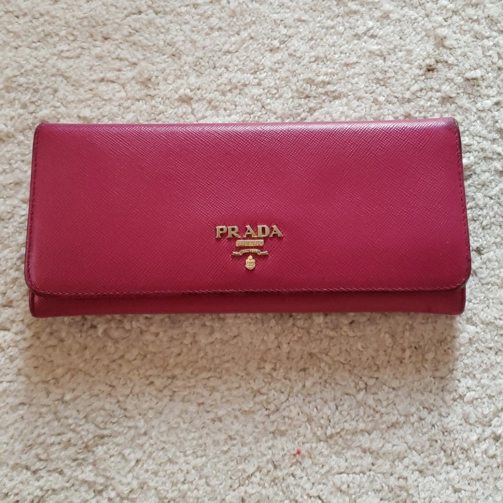 Prada saffiano wallet gold logo